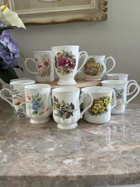 A Collection of 12 Bone China Mugs